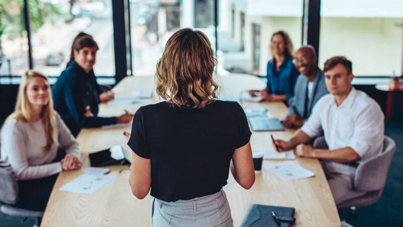 RCS Messaging business meeting around table